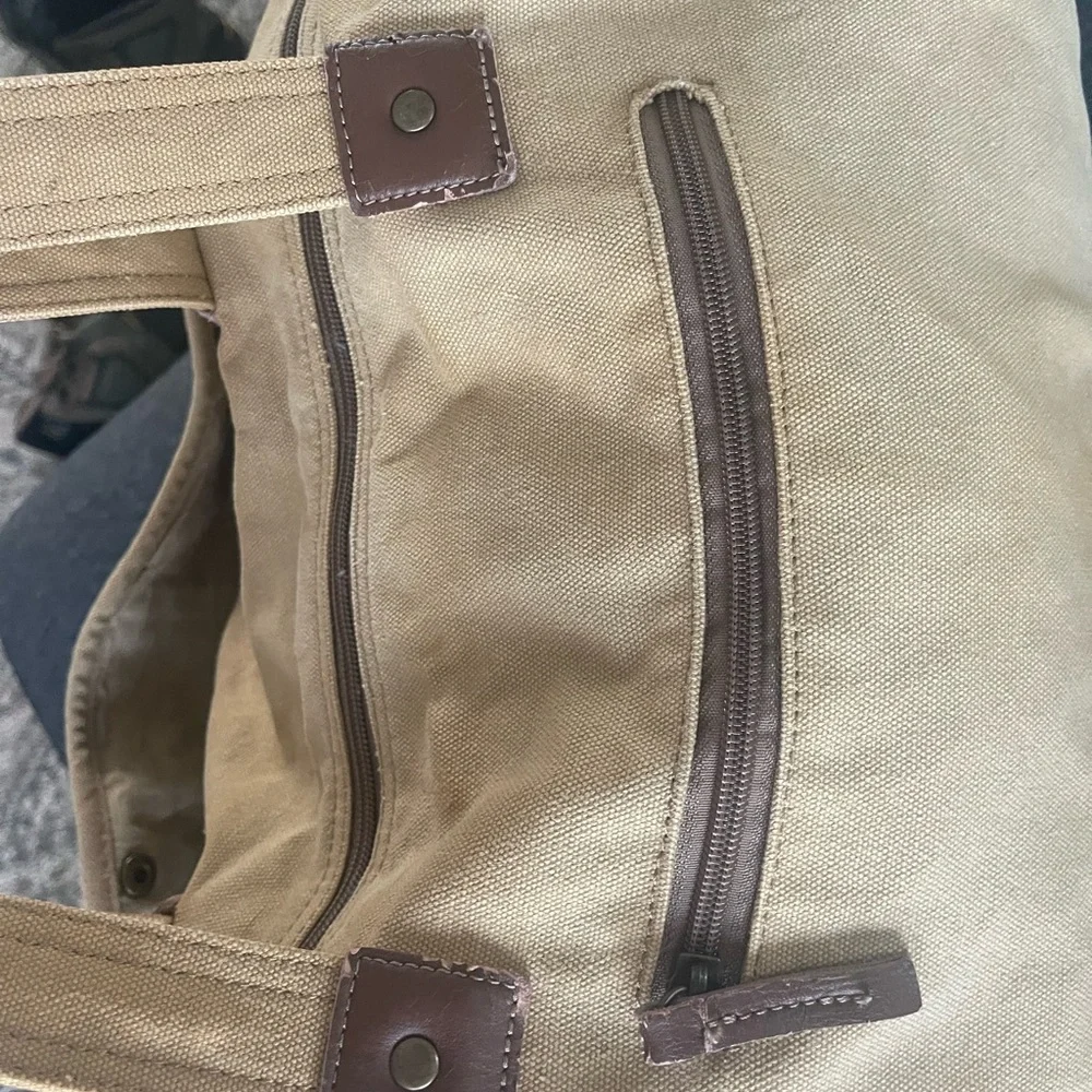 Canvas utility duffle travel bag .